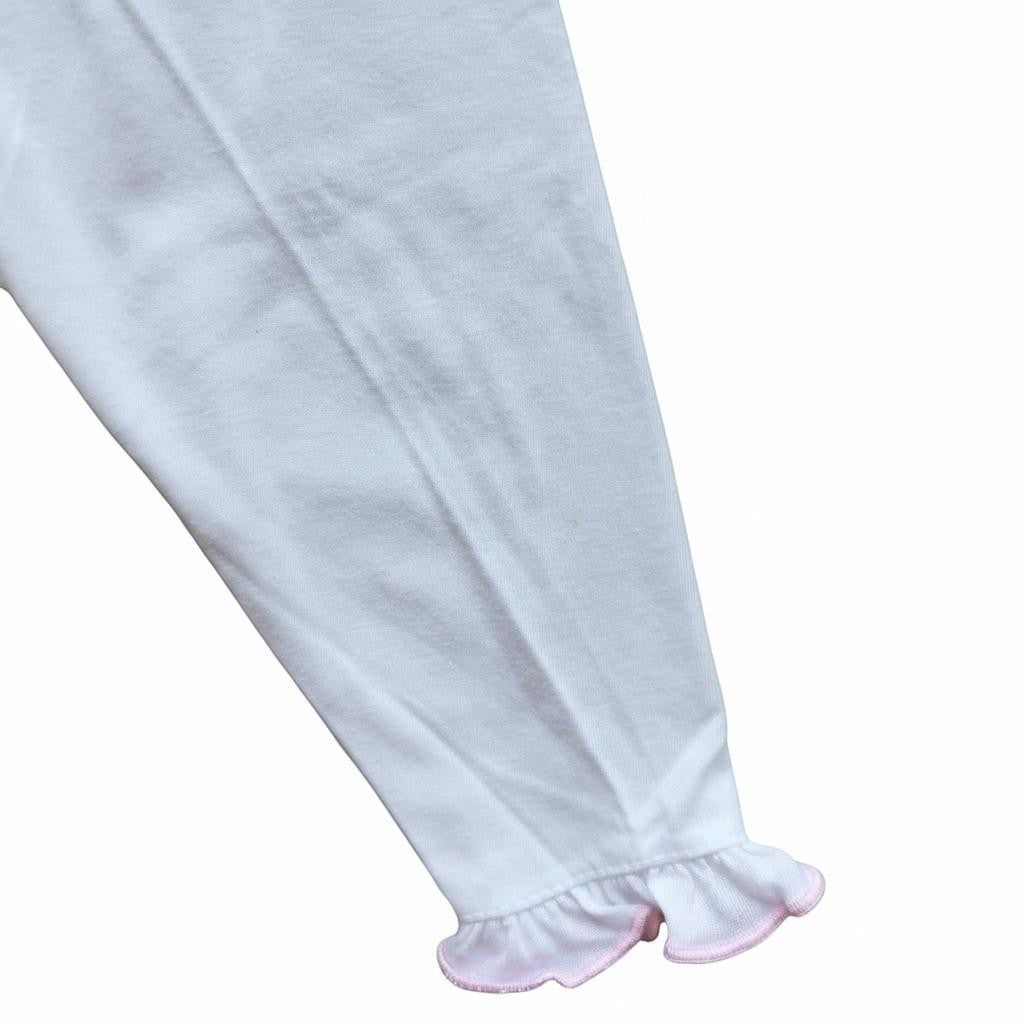 White legging with ruffled bottom on a white background